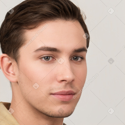 Neutral white young-adult male with short  brown hair and brown eyes