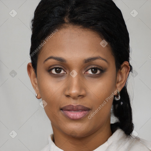 Joyful black young-adult female with short  black hair and brown eyes