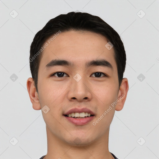 Joyful asian young-adult male with short  black hair and brown eyes