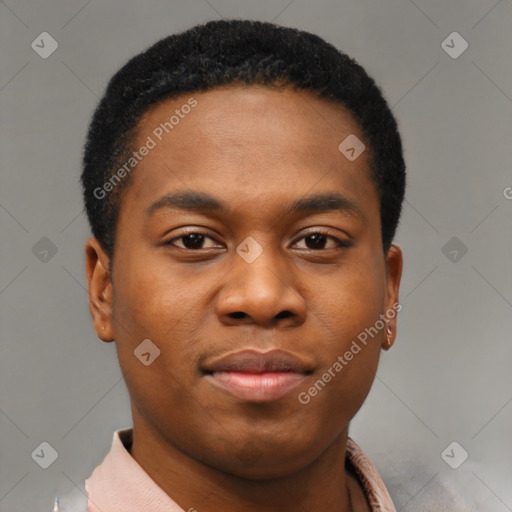 Joyful black young-adult male with short  brown hair and brown eyes
