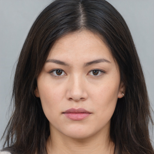 Neutral asian young-adult female with long  brown hair and brown eyes