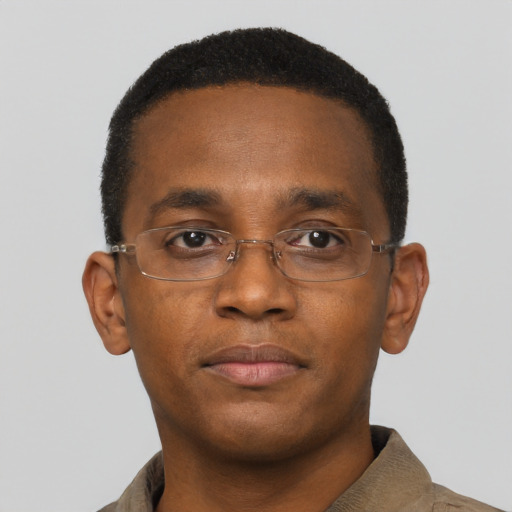 Neutral black young-adult male with short  black hair and brown eyes