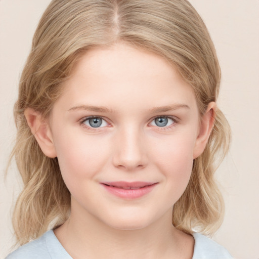 Joyful white child female with medium  brown hair and blue eyes