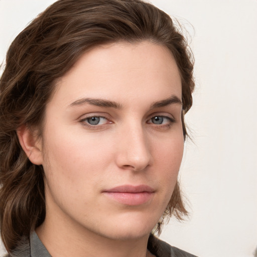 Neutral white young-adult female with medium  brown hair and grey eyes