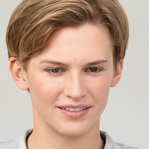 Joyful white young-adult female with short  brown hair and grey eyes