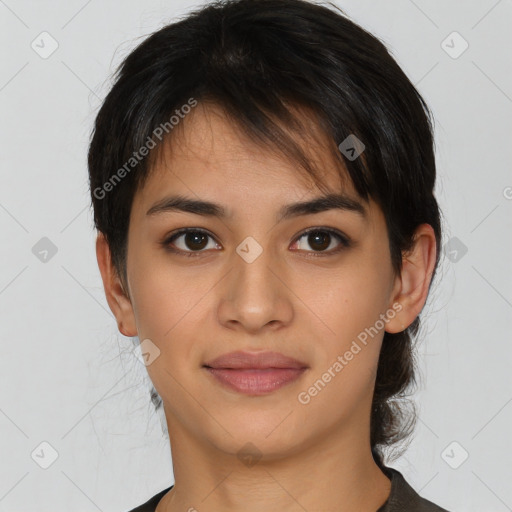 Joyful asian young-adult female with short  brown hair and brown eyes