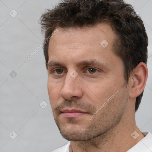 Neutral white adult male with short  brown hair and brown eyes