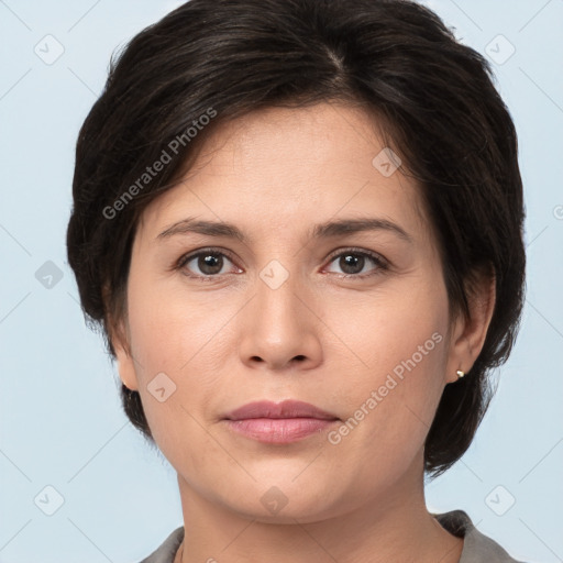 Joyful white young-adult female with medium  brown hair and brown eyes