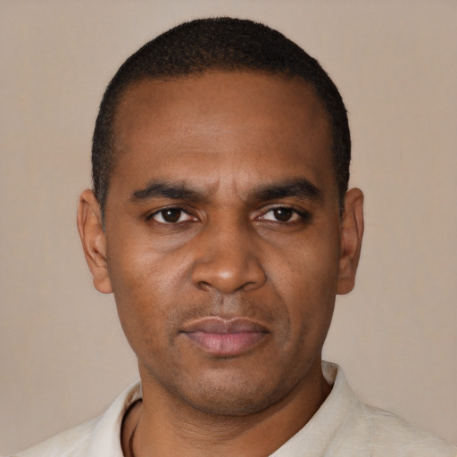 Neutral black young-adult male with short  brown hair and brown eyes
