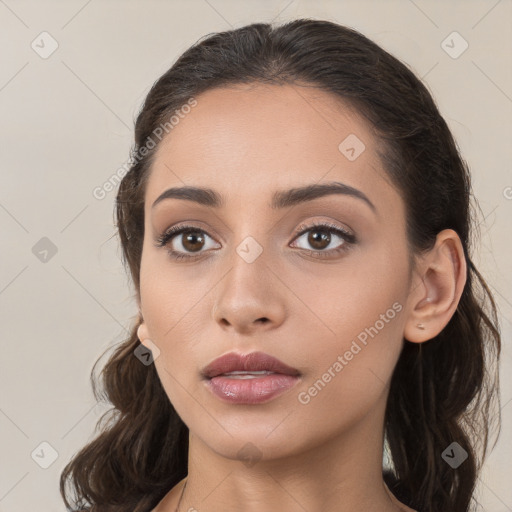 Neutral white young-adult female with long  brown hair and brown eyes