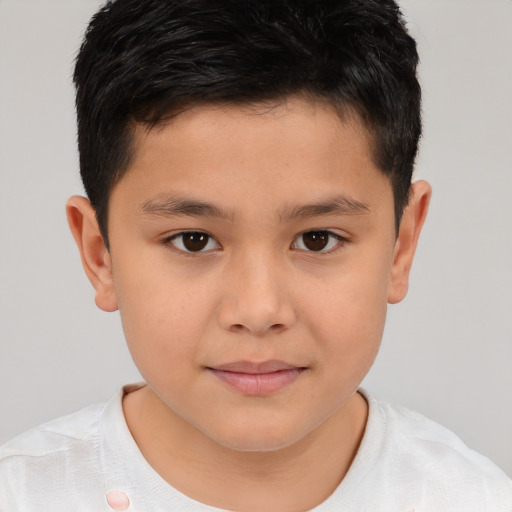 Joyful white child male with short  brown hair and brown eyes
