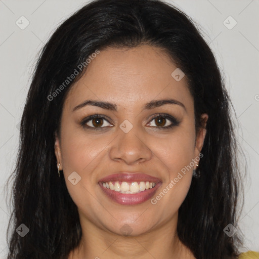 Joyful latino young-adult female with long  brown hair and brown eyes