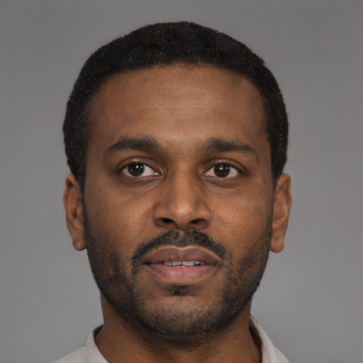 Neutral black young-adult male with short  brown hair and brown eyes
