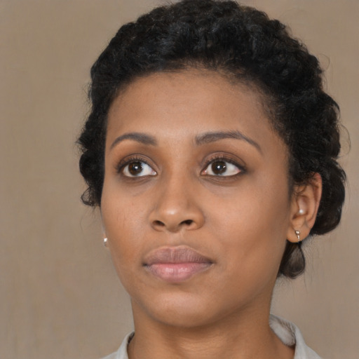 Neutral black young-adult female with short  brown hair and brown eyes