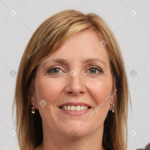 Joyful white adult female with medium  brown hair and grey eyes