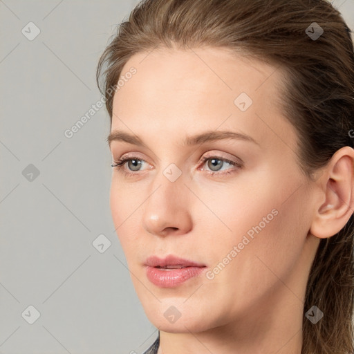 Neutral white young-adult female with long  brown hair and blue eyes