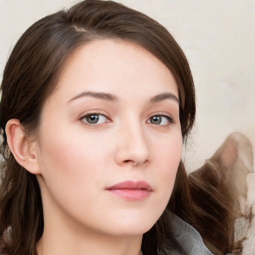 Neutral white young-adult female with medium  brown hair and grey eyes