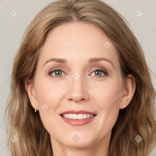 Joyful white young-adult female with long  brown hair and grey eyes