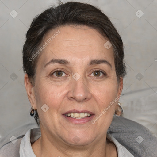 Joyful white adult female with short  brown hair and brown eyes