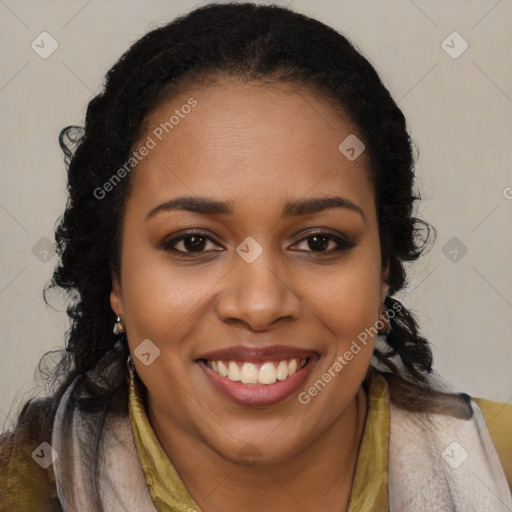 Joyful black young-adult female with long  brown hair and brown eyes