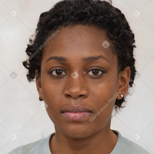 Neutral black young-adult female with short  brown hair and brown eyes