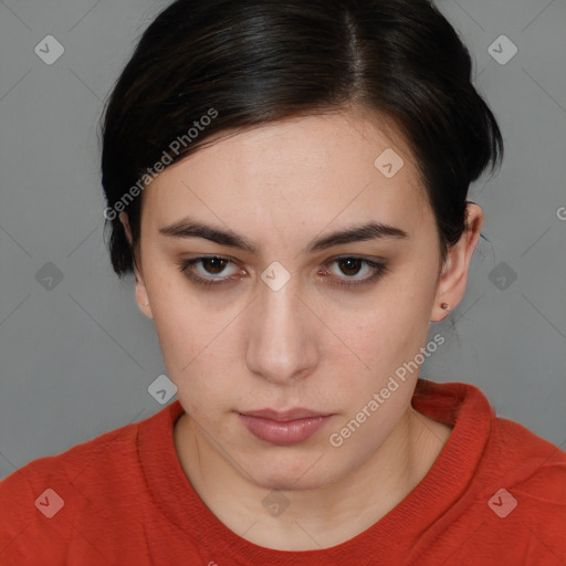 Neutral white young-adult female with medium  brown hair and brown eyes