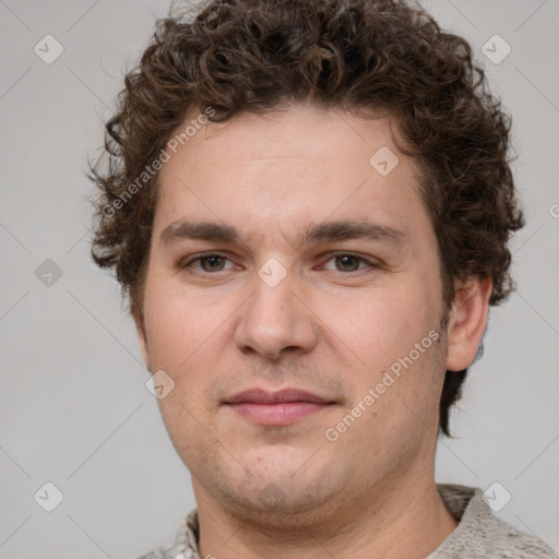 Neutral white young-adult male with short  brown hair and grey eyes