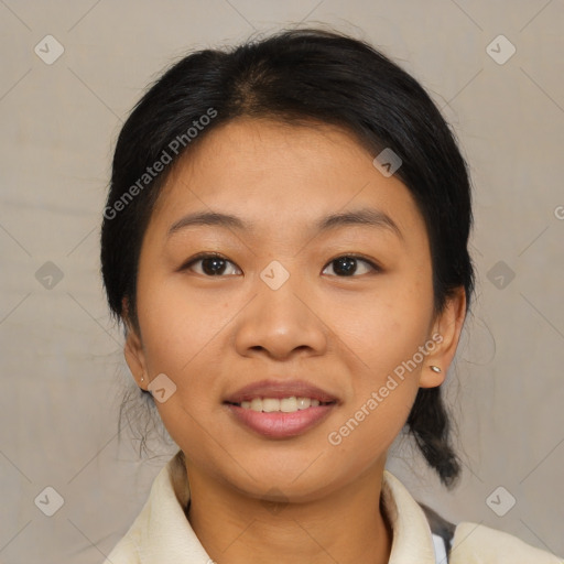 Joyful asian young-adult female with medium  brown hair and brown eyes