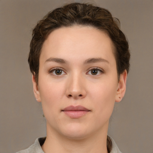 Neutral white young-adult female with short  brown hair and brown eyes