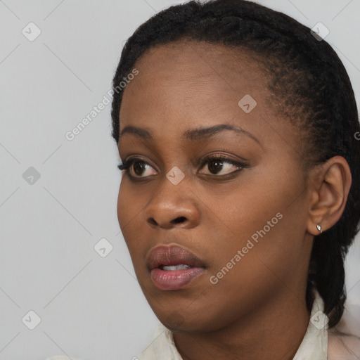 Neutral black young-adult female with short  black hair and brown eyes