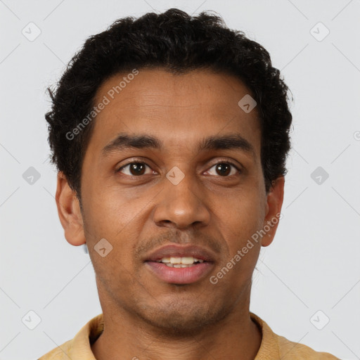 Joyful latino young-adult male with short  brown hair and brown eyes