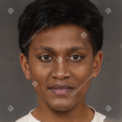 Joyful black young-adult male with short  brown hair and brown eyes