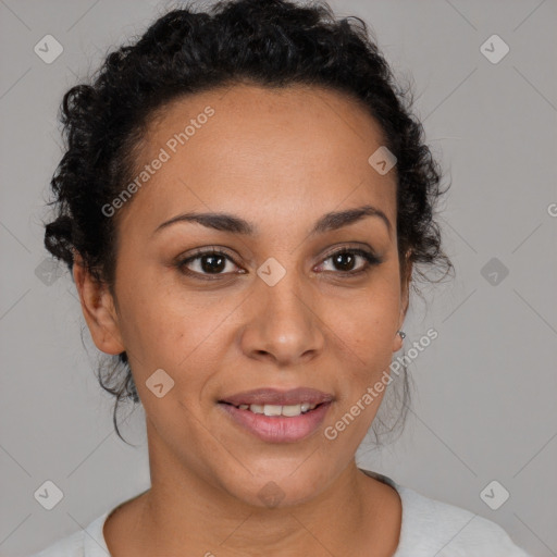 Joyful latino adult female with short  brown hair and brown eyes