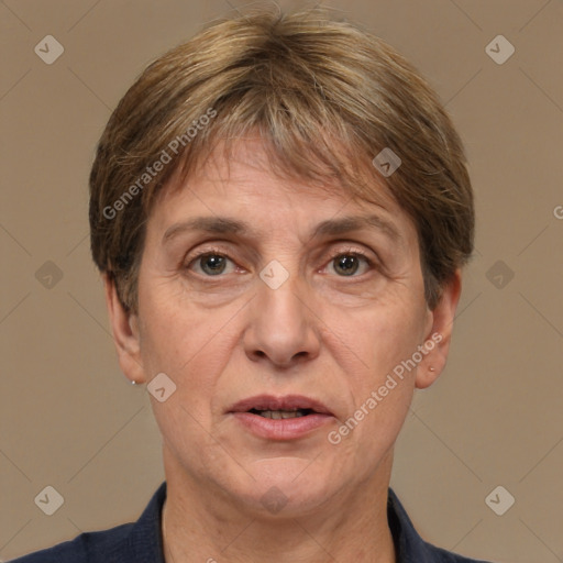 Joyful white middle-aged female with short  brown hair and brown eyes