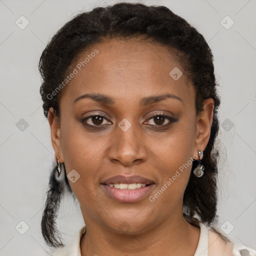 Joyful black young-adult female with short  brown hair and brown eyes