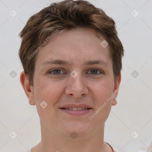 Joyful white young-adult female with short  brown hair and grey eyes