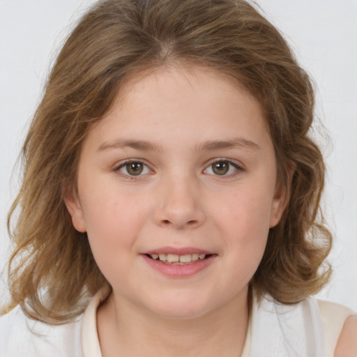 Joyful white child female with medium  brown hair and brown eyes