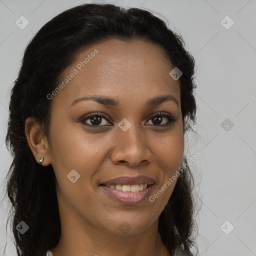 Joyful black young-adult female with long  brown hair and brown eyes