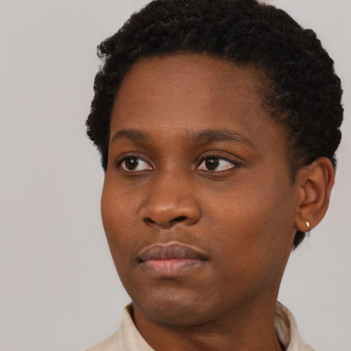 Neutral black young-adult female with short  brown hair and brown eyes