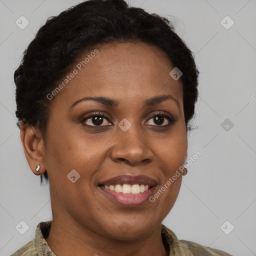 Joyful black young-adult female with short  brown hair and brown eyes