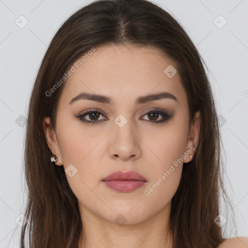 Neutral white young-adult female with long  brown hair and brown eyes