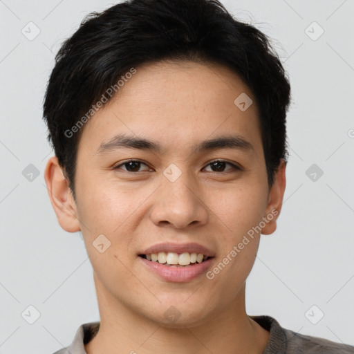 Joyful asian young-adult male with short  brown hair and brown eyes