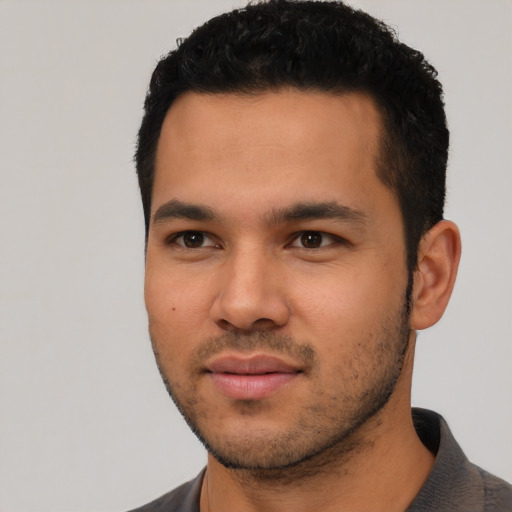 Neutral latino young-adult male with short  black hair and brown eyes