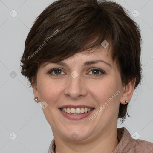 Joyful white adult female with medium  brown hair and grey eyes