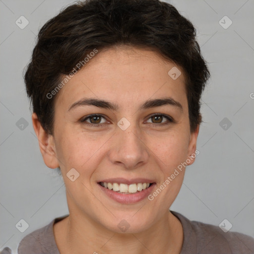 Joyful white young-adult female with short  brown hair and brown eyes