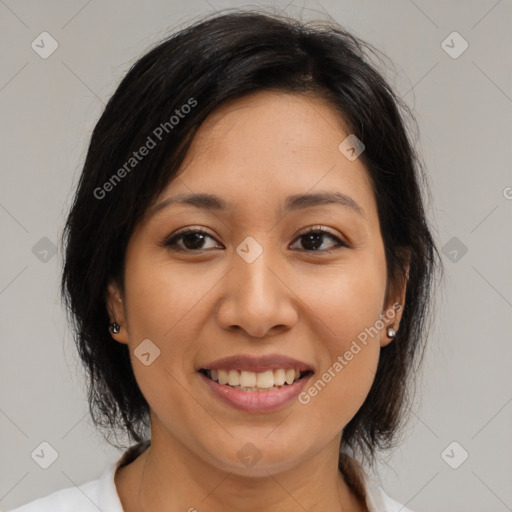 Joyful latino young-adult female with medium  brown hair and brown eyes