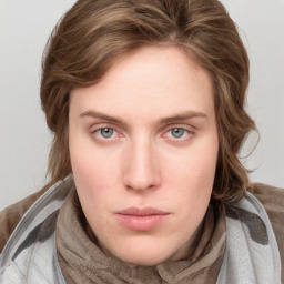 Neutral white young-adult female with medium  brown hair and blue eyes