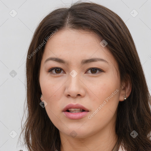 Neutral white young-adult female with long  brown hair and brown eyes