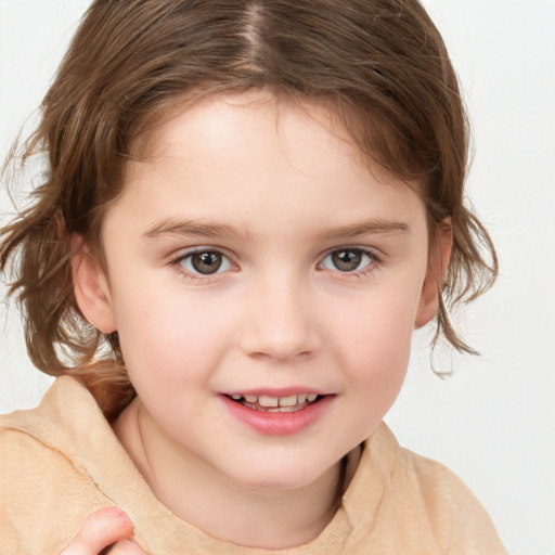 Joyful white child female with medium  brown hair and brown eyes