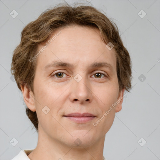 Joyful white adult female with short  brown hair and brown eyes